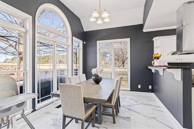 dining room featuring vaulted ceiling, marble finish floor, a notable chandelier, and baseboards