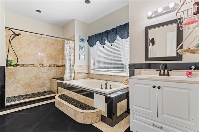 full bathroom with a garden tub, vanity, tiled shower, and tile patterned floors