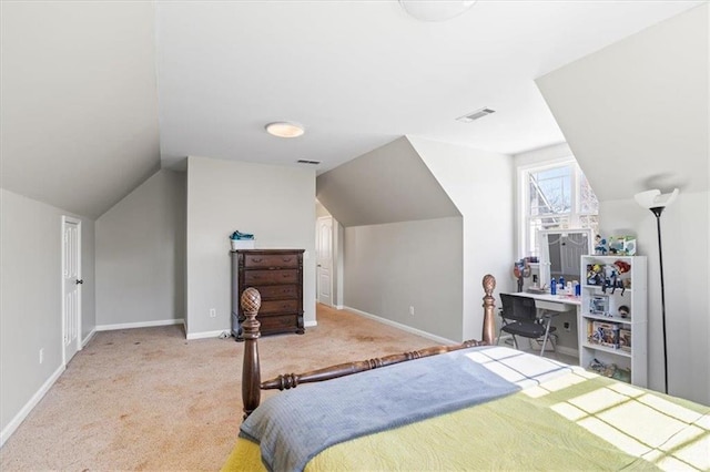 carpeted bedroom featuring visible vents, vaulted ceiling, and baseboards