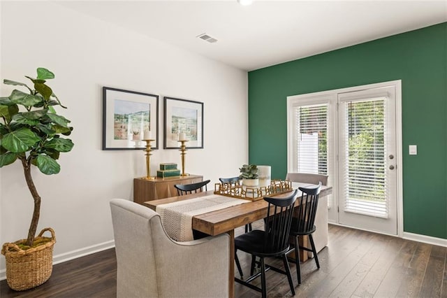 dining room featuring dark wood-type flooring