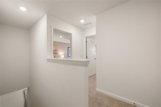 hallway featuring carpet floors