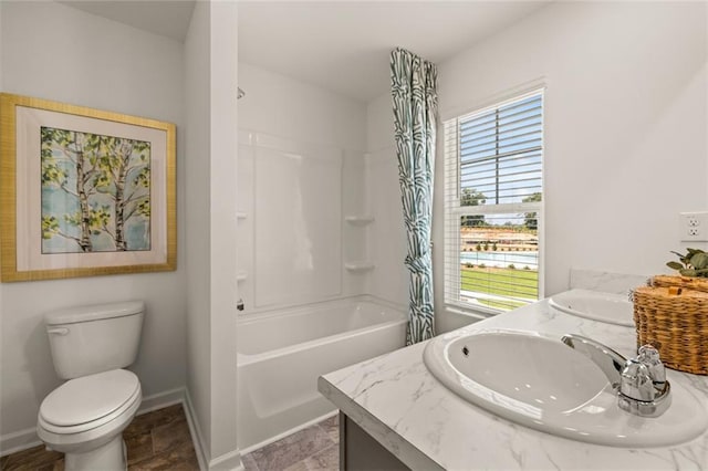 full bathroom featuring vanity, toilet, and shower / bath combination