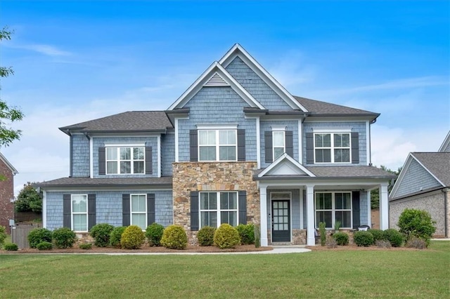 2953 Balvenie Pl, Acworth, GA 30101 - craftsman-style home with a front yard and stone siding