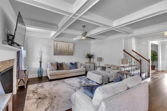 2953 Balvenie Pl, Acworth, GA 30101 - living room featuring ceiling fan, wood finished floors, beam ceiling, stairs, and a fireplace