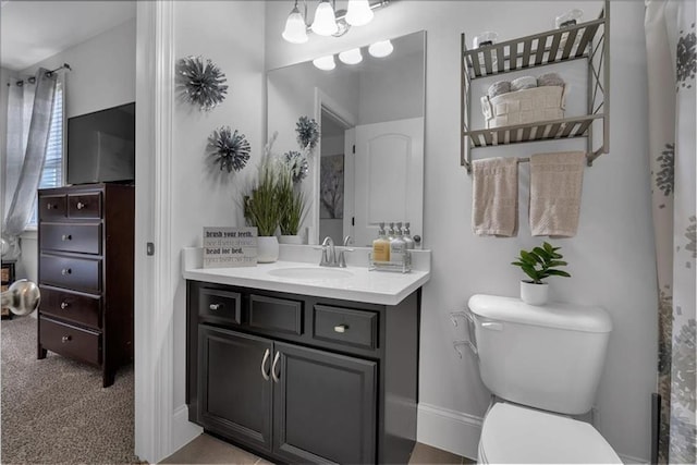 2953 Balvenie Pl, Acworth, GA 30101 - bathroom featuring vanity, toilet, and baseboards