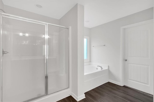 822 Pine Way, Dallas, GA 30157 - full bathroom with a bath, a stall shower, baseboards, and wood finished floors