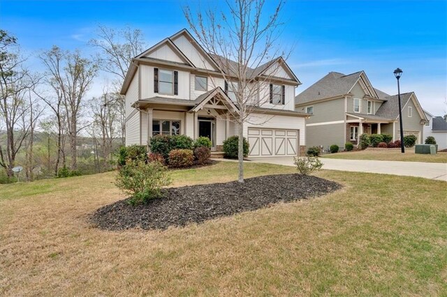 822 Pine Way, Dallas, GA 30157 - view of front of home with a garage, a front lawn, and concrete driveway
