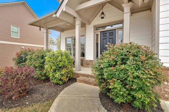 822 Pine Way, Dallas, GA 30157 - doorway to property featuring a porch
