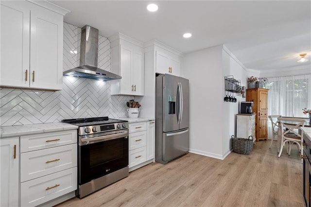 114 Narrows Loop, Waleska, GA 30183 - kitchen with stainless steel appliances, wall chimney exhaust hood, baseboards, decorative backsplash, and light wood-style flooring