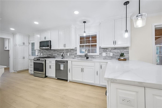1830 Mayfield Rd, Alpharetta, GA 30009 - kitchen with appliances with stainless steel finishes, a sink, decorative backsplash, white cabinetry, and recessed lighting