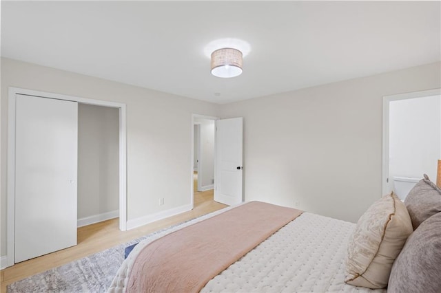 1830 Mayfield Rd, Alpharetta, GA 30009 - bedroom with light wood finished floors and baseboards