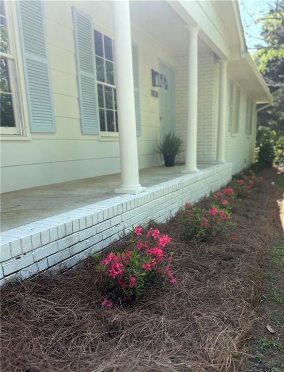 1830 Mayfield Rd, Alpharetta, GA 30009 - view of side of home with covered porch and brick siding