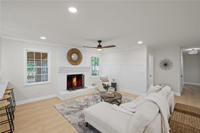 1830 Mayfield Rd, Alpharetta, GA 30009 - living area featuring light wood-type flooring, a fireplace, a ceiling fan, recessed lighting, and baseboards