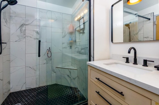 bathroom with vanity and a stall shower