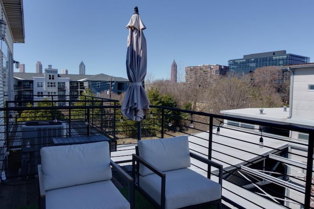 balcony featuring a view of city