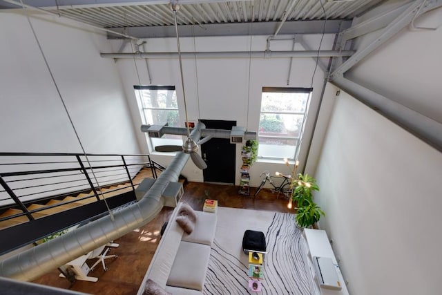 interior space with wood finished floors and a wealth of natural light