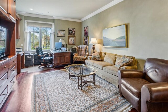 living area featuring ornamental molding and dark wood finished floors