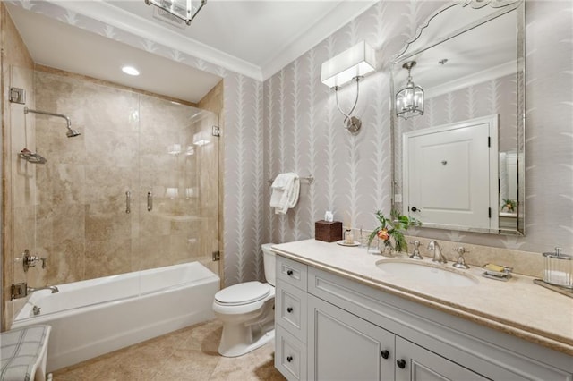 bathroom with washtub / shower combination, vanity, wallpapered walls, and toilet