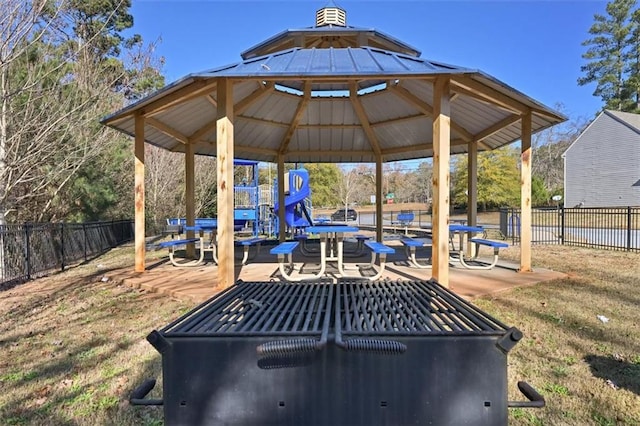 view of patio / terrace featuring a gazebo and a playground