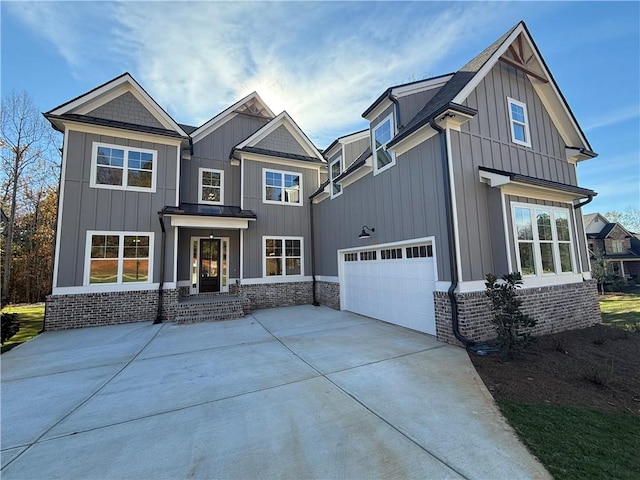 craftsman house with a garage