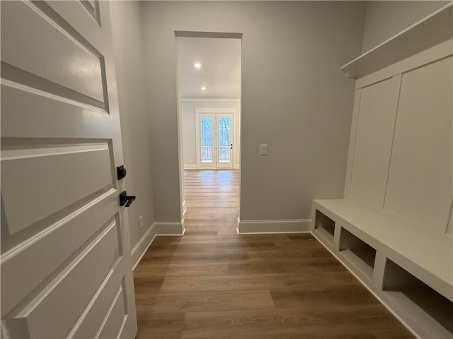 mudroom with hardwood / wood-style flooring