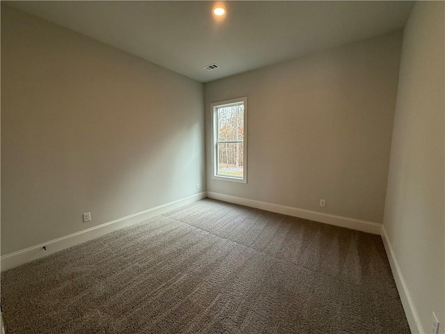 empty room with carpet floors