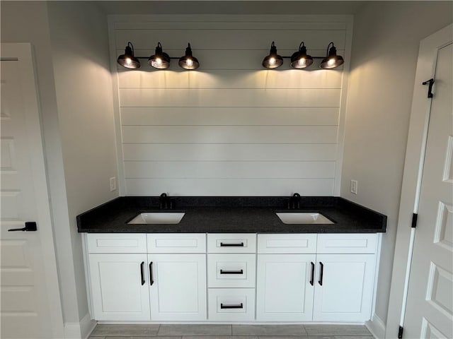 bathroom featuring tile patterned floors and vanity