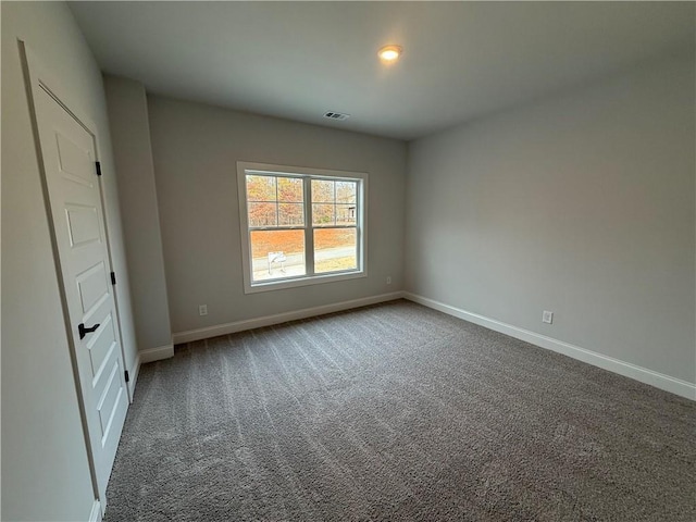 unfurnished bedroom featuring carpet