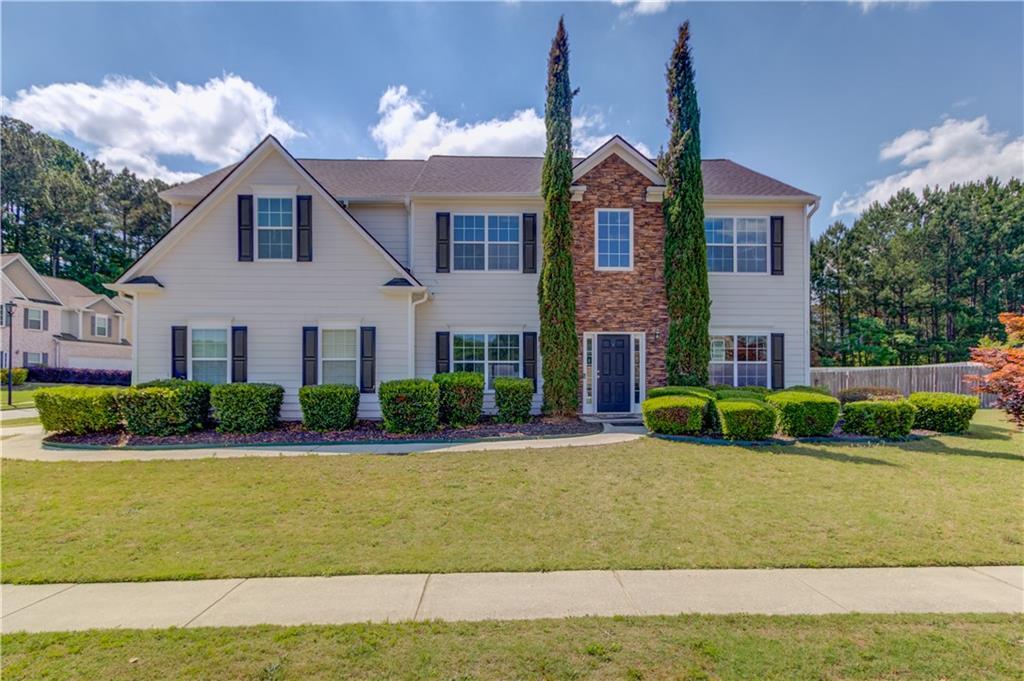 1043 Lexus Dr, Lawrenceville, GA 30045 - view of front of property featuring stone siding