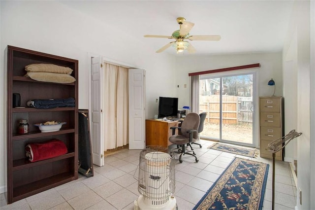 tiled office featuring ceiling fan and lofted ceiling