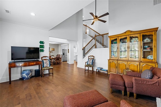 352 Davis St, Monroe, GA 30655 - living area with stairs, visible vents, ceiling fan, and wood finished floors
