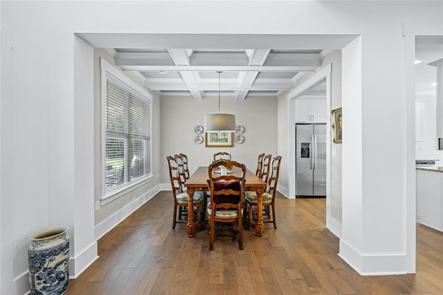 352 Davis St, Monroe, GA 30655 - dining space featuring coffered ceiling, wood finished floors, baseboards, and beam ceiling