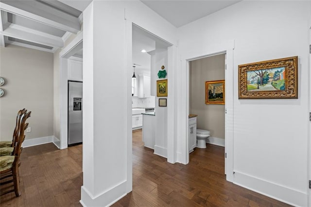 352 Davis St, Monroe, GA 30655 - hall featuring dark wood-style flooring and baseboards