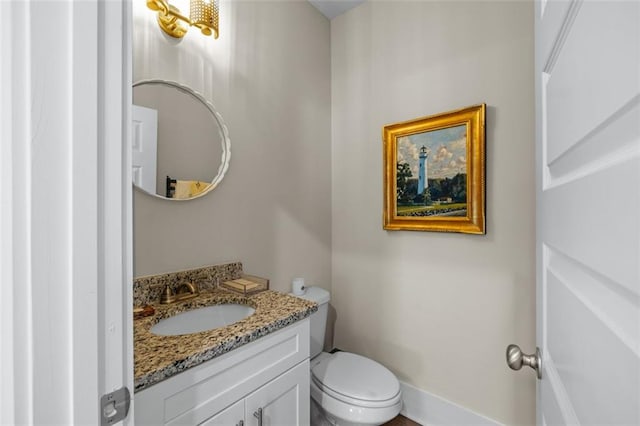 352 Davis St, Monroe, GA 30655 - bathroom with vanity and toilet
