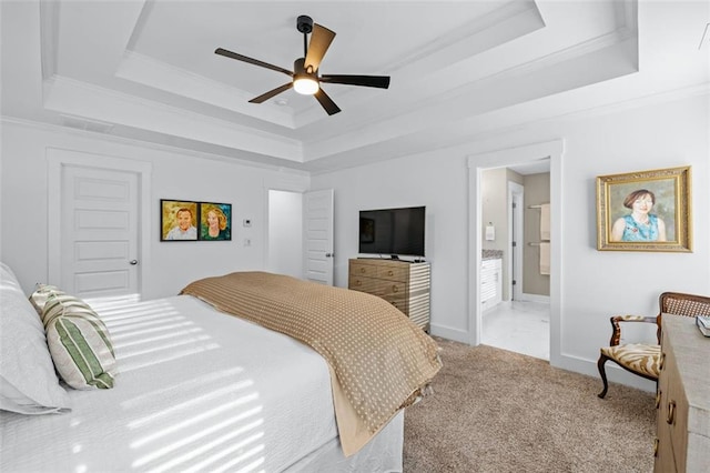 352 Davis St, Monroe, GA 30655 - carpeted bedroom with ornamental molding, a tray ceiling, and baseboards