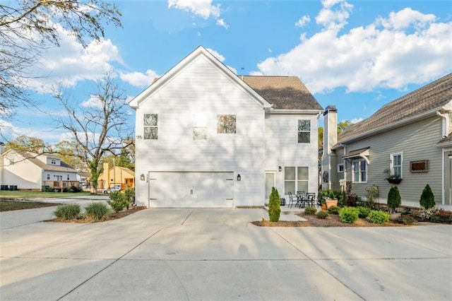 352 Davis St, Monroe, GA 30655 - view of front of property featuring an attached garage and concrete driveway