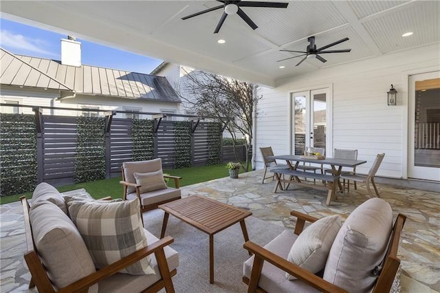 view of patio / terrace featuring french doors, ceiling fan, and outdoor lounge area