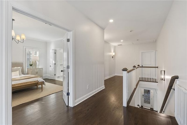 hall with dark hardwood / wood-style flooring