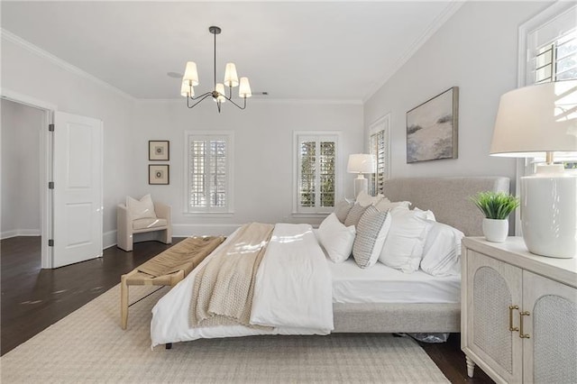 bedroom with dark hardwood / wood-style flooring, a notable chandelier, and ornamental molding