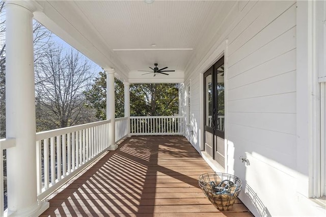 wooden deck with ceiling fan