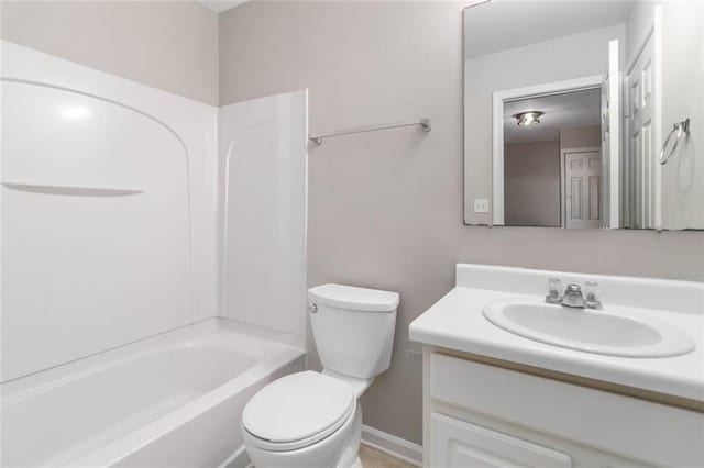 bathroom with toilet, vanity, and shower / bath combination