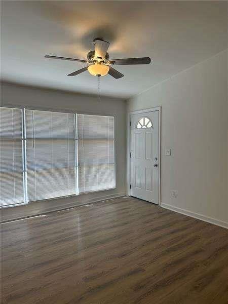 2041 Olive Springs Rd, Marietta, GA 30060 - entrance foyer featuring baseboards, dark wood-type flooring, and a ceiling fan