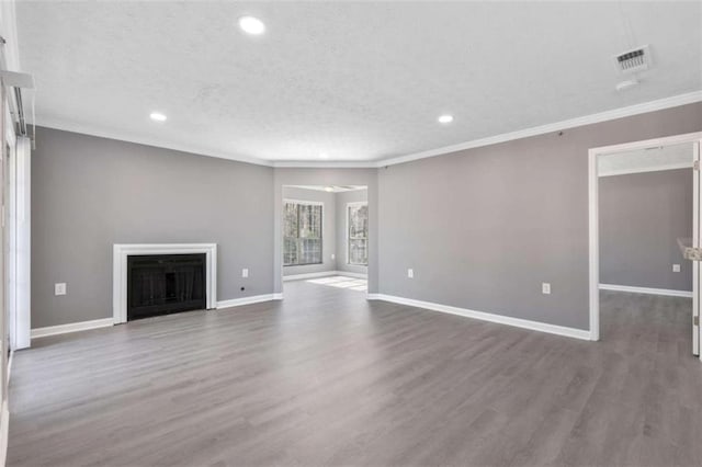 504 Mill Pond Ct, Smyrna, GA 30082 - unfurnished living room with recessed lighting, wood finished floors, ornamental molding, a textured ceiling, and a fireplace