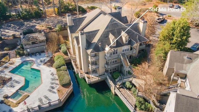 504 Mill Pond Ct, Smyrna, GA 30082 - aerial view of property and surrounding area featuring a pool and a nearby body of water