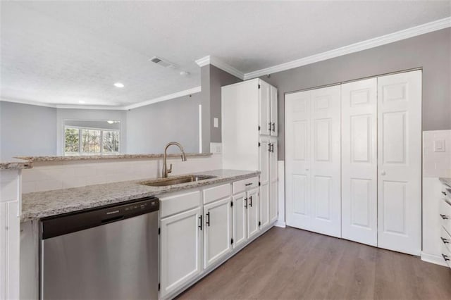 504 Mill Pond Ct, Smyrna, GA 30082 - kitchen featuring dishwasher, white cabinets, crown molding, wood finished floors, and light stone countertops