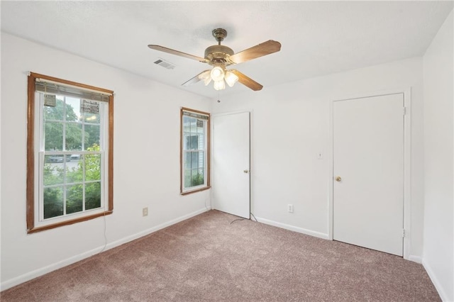 742 Redland Dr, Jonesboro, GA 30238 - unfurnished bedroom featuring carpet floors, baseboards, and a ceiling fan