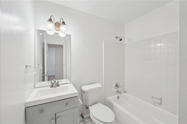 742 Redland Dr, Jonesboro, GA 30238 - bathroom with toilet, vanity, bathtub / shower combination, and baseboards