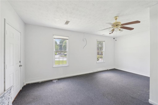 742 Redland Dr, Jonesboro, GA 30238 - carpeted spare room with ceiling fan, baseboards, and a textured ceiling