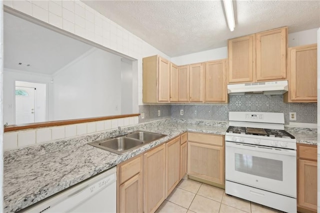 742 Redland Dr, Jonesboro, GA 30238 - kitchen featuring white appliances, under cabinet range hood, light brown cabinets, a sink, and a textured ceiling