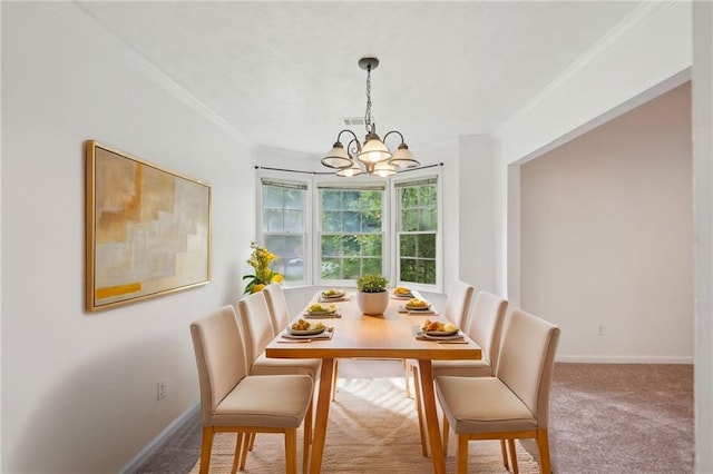 742 Redland Dr, Jonesboro, GA 30238 - dining space with a chandelier, crown molding, carpet flooring, and baseboards